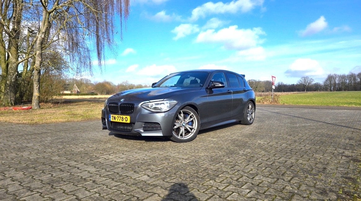 BMW 1-Serie 3.0 M135i 5DR Xdrive AUT 2014 Grijs, Auto's, 320 pk, Leder, Vierwielaandrijving, Particulier