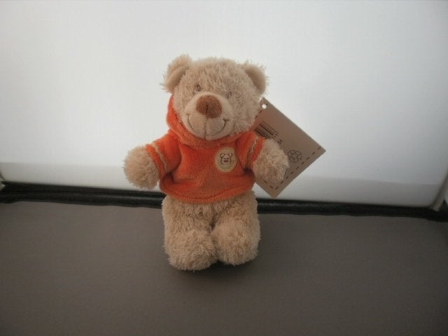 nicotoy beer met oranje trui rammel in hoofd bruin beige, Met kleding of accessoire, Beer, Nieuw, Ophalen of Verzenden