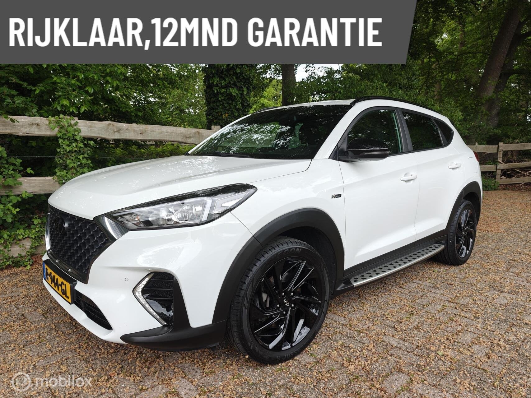 Hyundai Tucson 1.6 T-GDI N-Line|Trekhaak|Stoelverw.|Camera, Auto's, 4 cilinders, Wit, 1600 kg, SUV of Terreinwagen