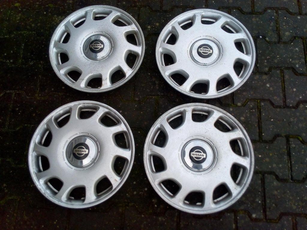 Wieldoppen Nissan Primera 403151F511, Ophalen of Verzenden