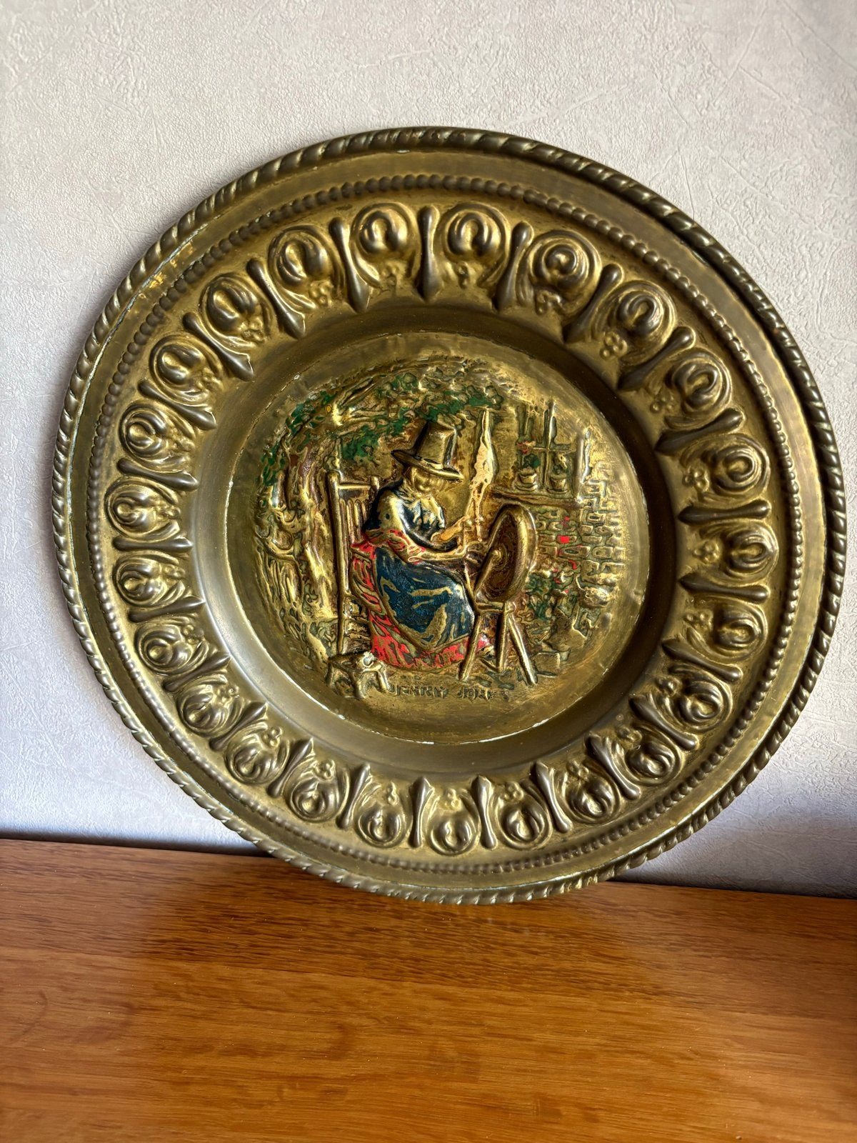 Vintage wandbord met spinnende vrouw, Antiek en Kunst, Ophalen of Verzenden, Brons