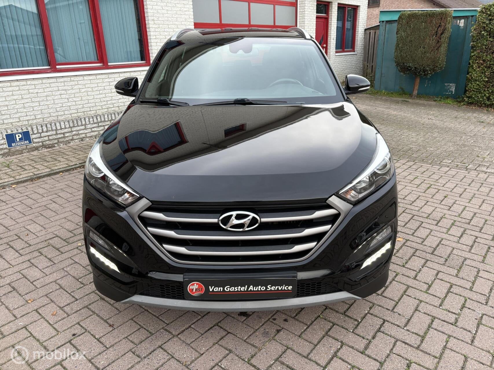 Hyundai Tucson 1.6 T-GDi Comfort 4WD NAVI/CAMERA/CRUISE, Auto's, Stof, Gebruikt, 4 cilinders, Zwart