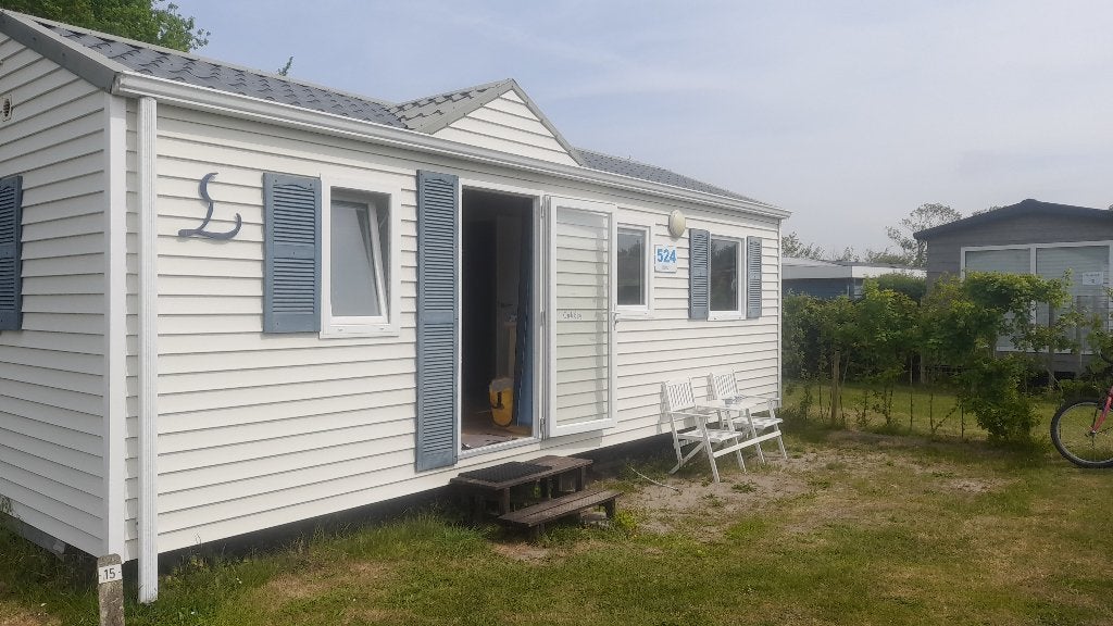 Stacaravan/chalet met vaste staanplaats in Ouddorp, Caravans en Kamperen, Stacaravans, Tot en met 5