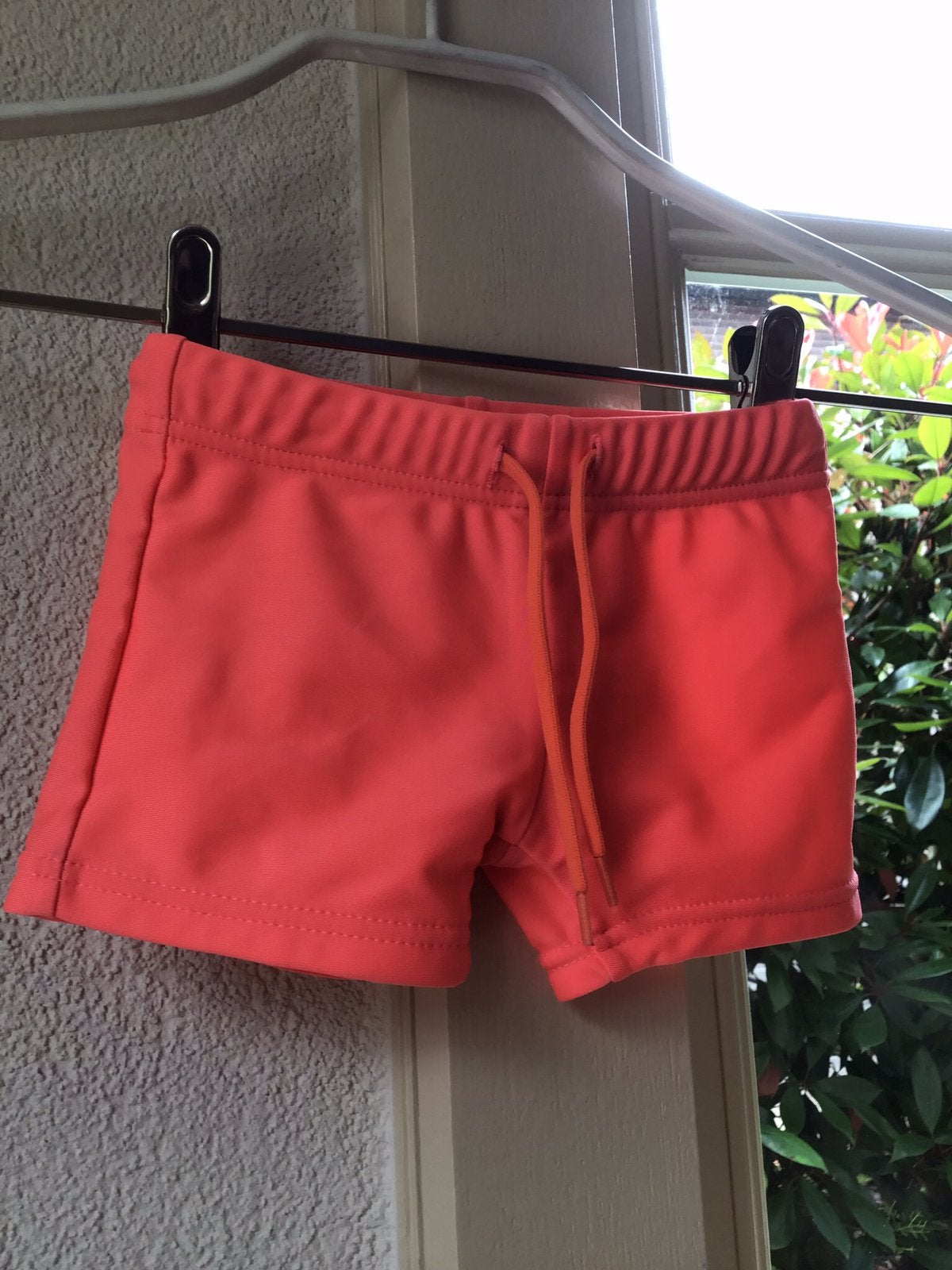 Nieuwe Hema Zwembroek koraal kleur maat 62/6, Maat 62, Nieuw, Ophalen of Verzenden, Zwembroek