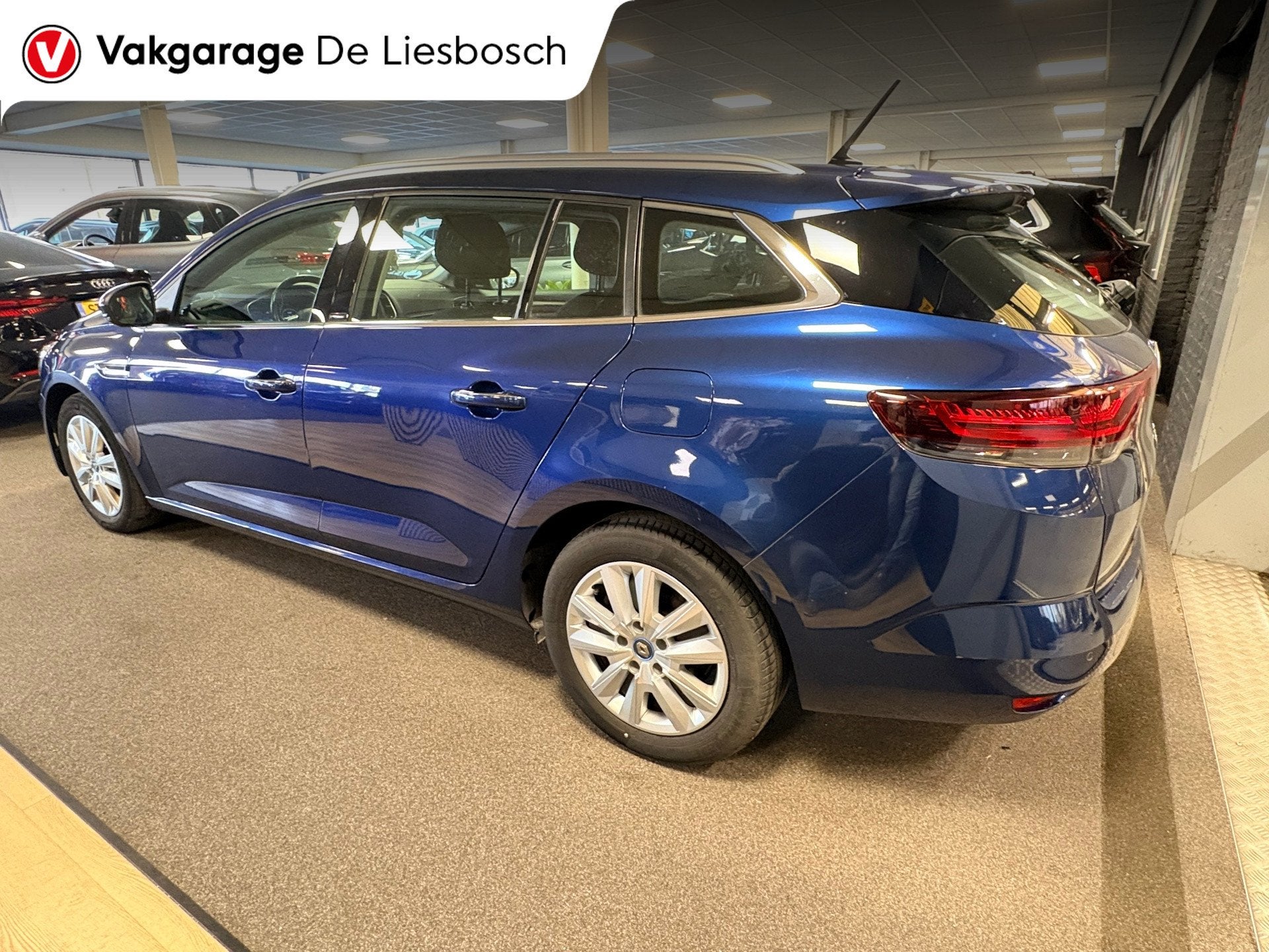 Renault Mégane Estate 1.6 E-Tech Plug-In Hybrid 160 Busines, Auto's, Renault, Dealer onderhouden, Gebruikt, 4 cilinders, Blauw