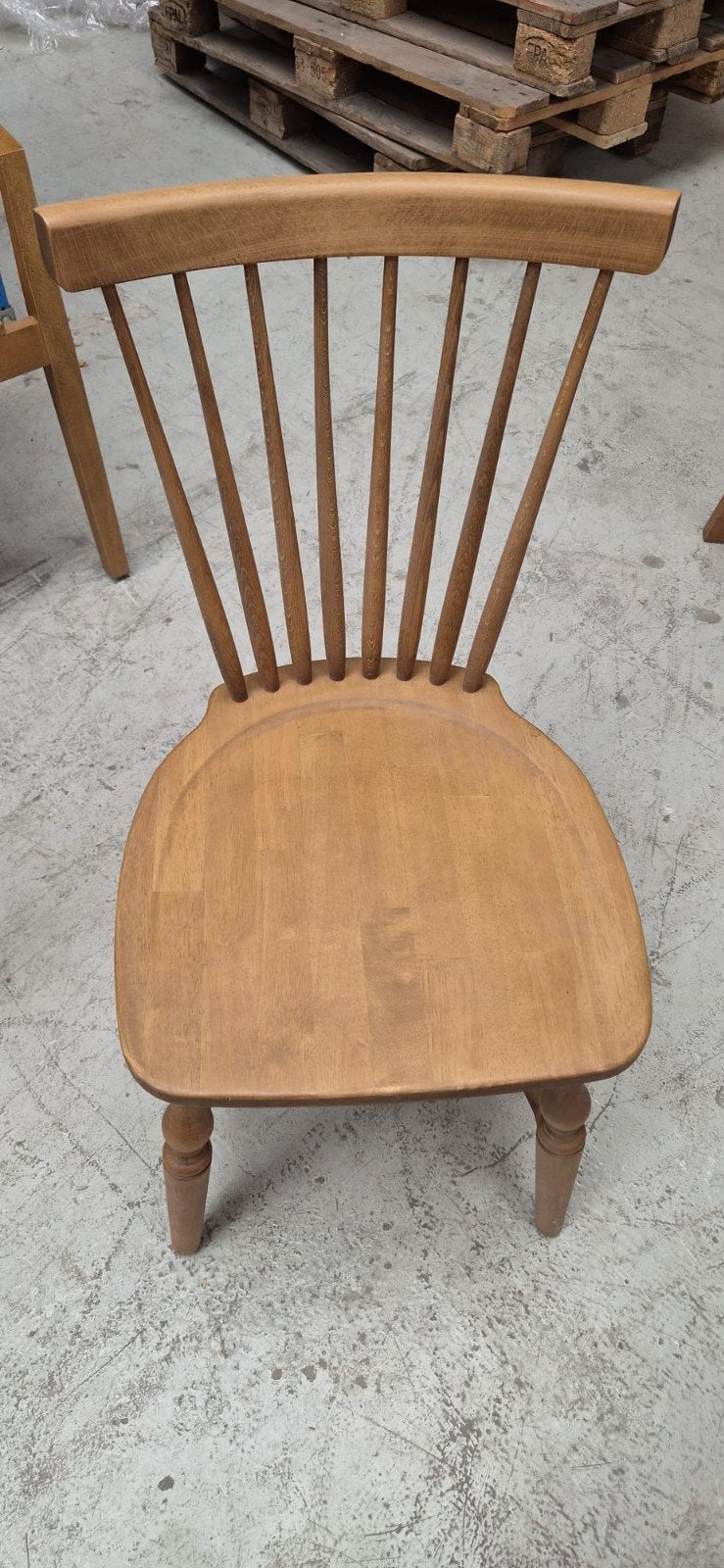 Houten eetkamerstoel met spijlenrug, Ophalen