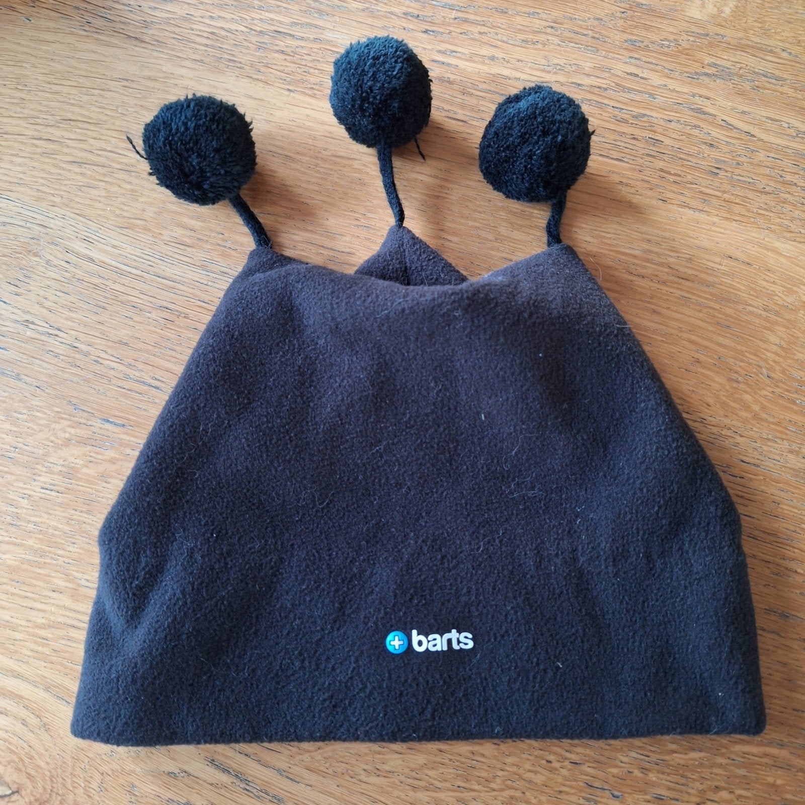 Barts muts pumkin zwart grootte 53 met 3 pompom lekker warm, Gebruikt, Jongetje of Meisje, Ophalen of Verzenden, Muts