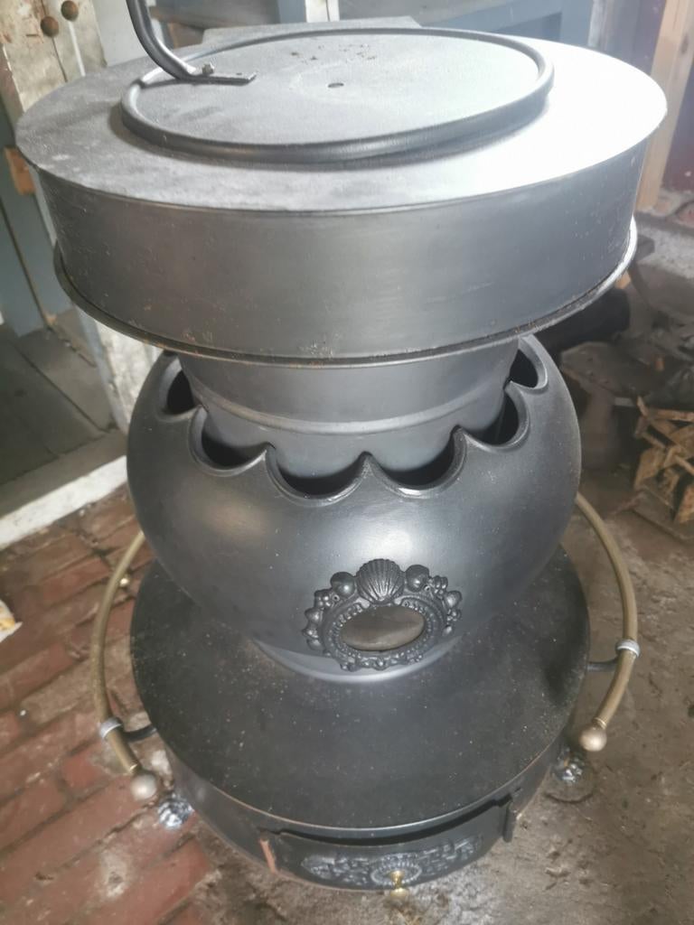 Antieke gietijzeren potkachel - Nederlands design, Ophalen of Verzenden