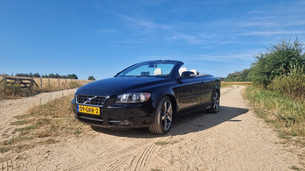 Volvo C70 2.4 Summum | 2008 | 168.000km | Automaat | Zwart, Auto's, Volvo, Dealer onderhouden, C70, Automatische klimaatregeling