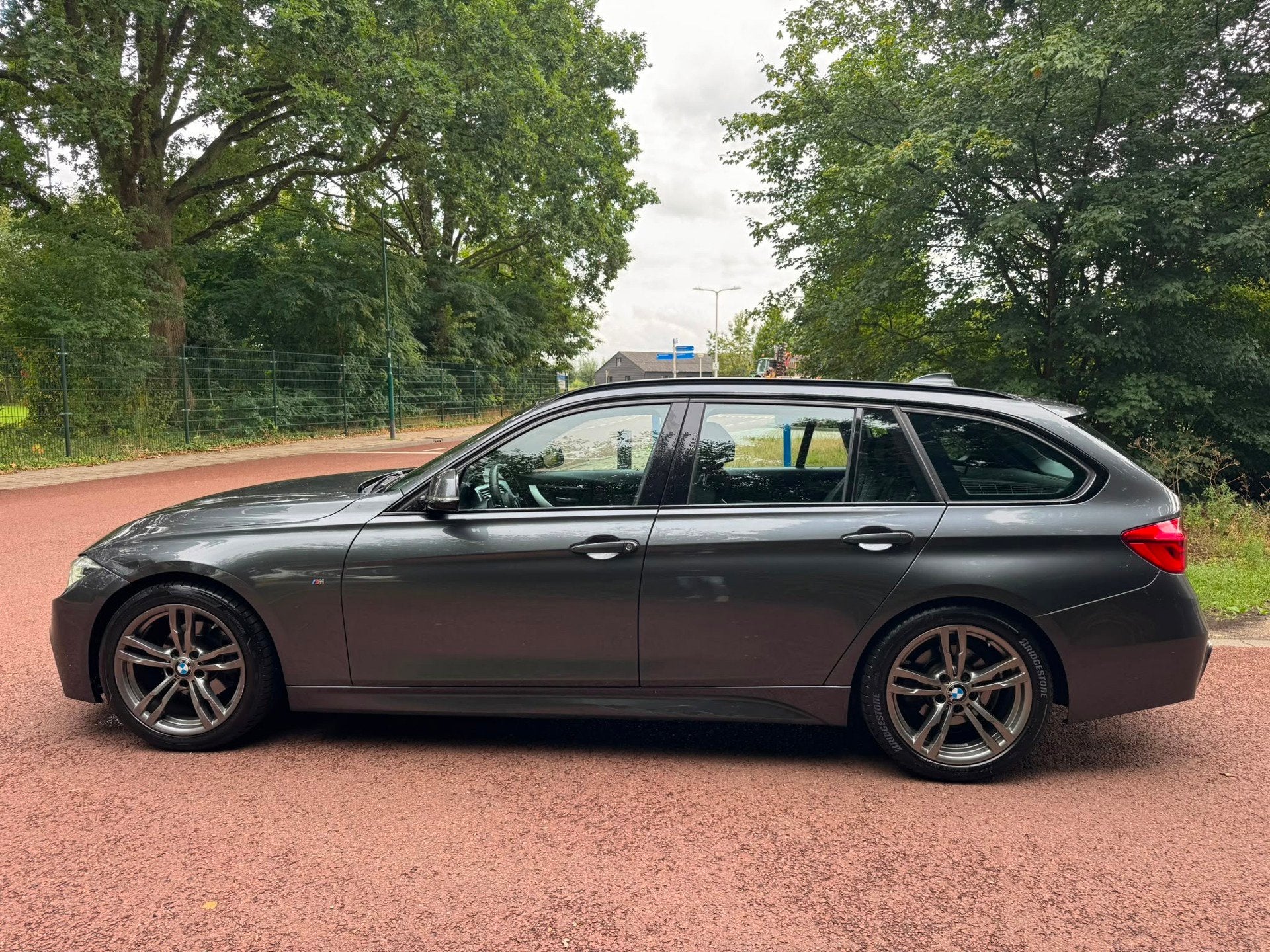 BMW 3-serie Touring 318i Centennial Executive / Navi / Xenon, Auto's, Automaat, Gebruikt, Euro 6, 1465 kg