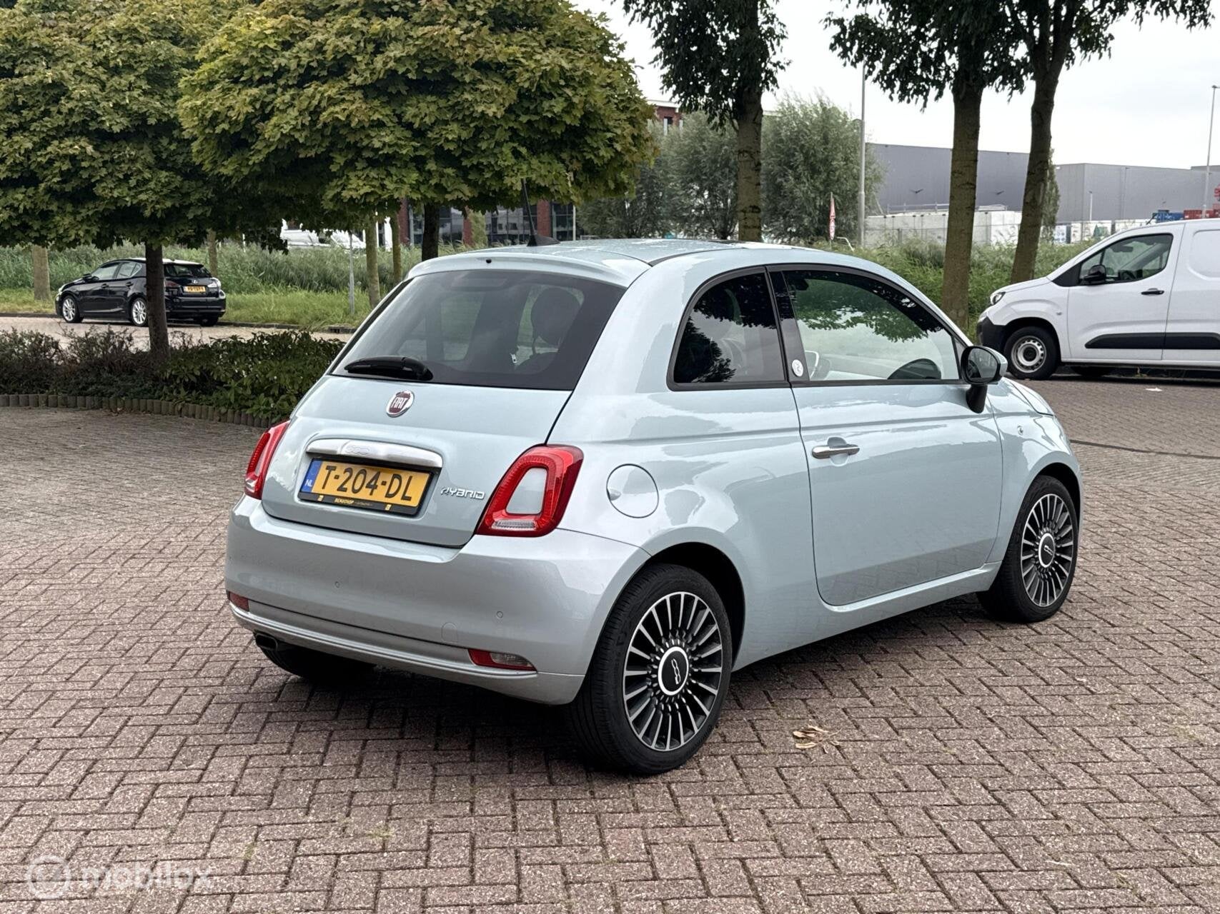 Fiat 500 1.0 Hybrid Launch Edition Panodak Leer Navi Carplay, Auto's, Voorwielaandrijving, 40 €/maand, 4 stoelen, Leder en Stof