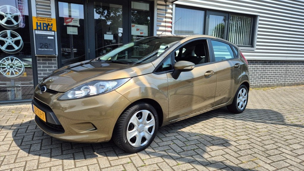 Ford FIESTA 1.25 Titanium AIRCO  EL RAMEN CENTR VERG AFST NA, Euro 5, 1242 cc, 4 cilinders, Bruin