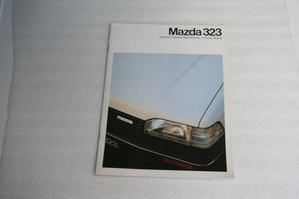 Folder Mazda 323 (06-1987) (23), Ophalen of Verzenden, Nieuw, Mazda
