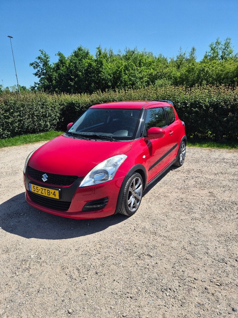 Suzuki Swift 1.2 3-D 2013 Rood, Auto's, Suzuki, Voorwielaandrijving, Stof, Swift, Origineel Nederlands