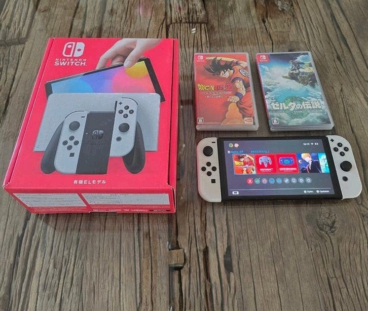 Nintendo Switch OLED met 2 games - Japanse versie + doos, Switch OLED, Met games, Ophalen of Verzenden, Zo goed als nieuw
