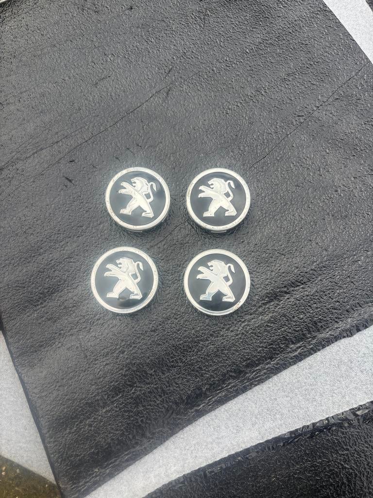 Peugeot wieldopjes/naafdeksels, set van 4, Ophalen of Verzenden, Gebruikt, Peugeot