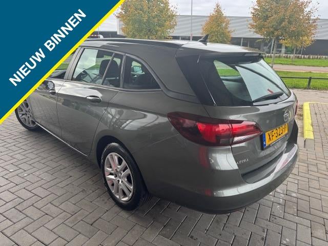 Opel Astra Sports Tourer 1.0 TURBO 105 PK ONLINE EDITION (77, Auto's, Opel, Voorwielaandrijving, Gebruikt, Euro 6, 1178 kg