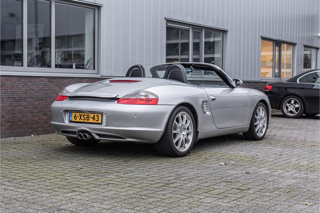 Porsche Boxster verzorgd exemplaar 2.7 handgeschakeld, Auto's, Porsche, 228 pk, Achterwielaandrijving, Gebruikt, Zwart
