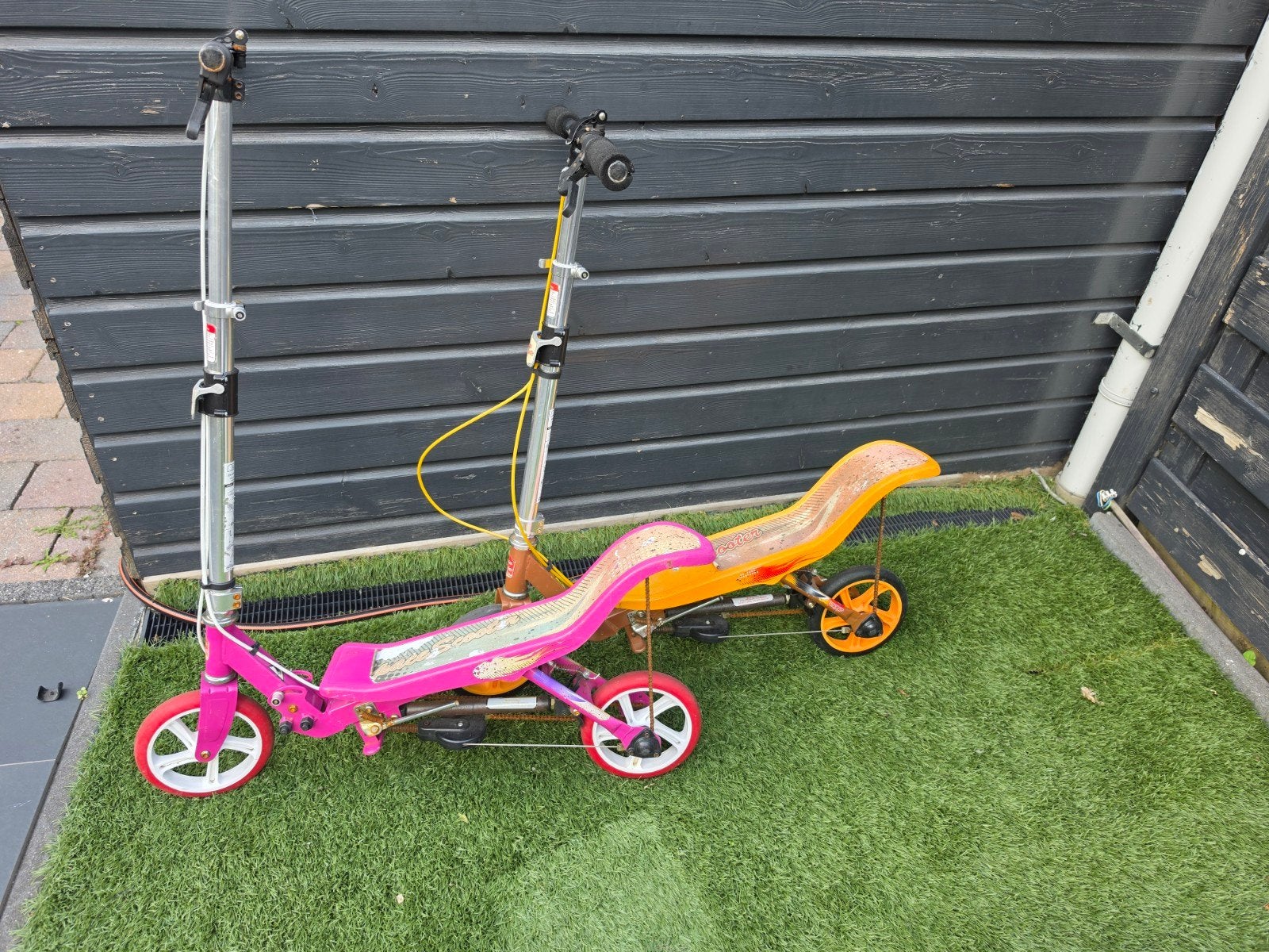 space scooters (2 stuks) - Roze en Oranje, Ophalen, Gebruikt, Gewone step, Onbekend