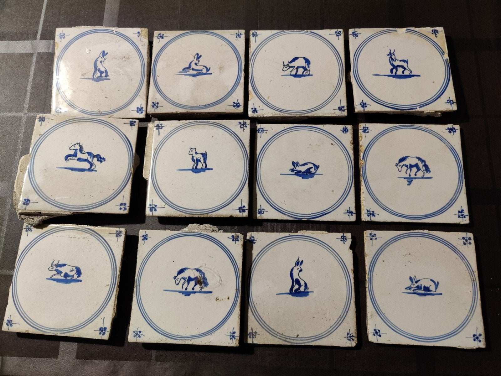 Antieke Hollandse Delfts Blauwe Tegels met Dieren (12 stuks), Ophalen