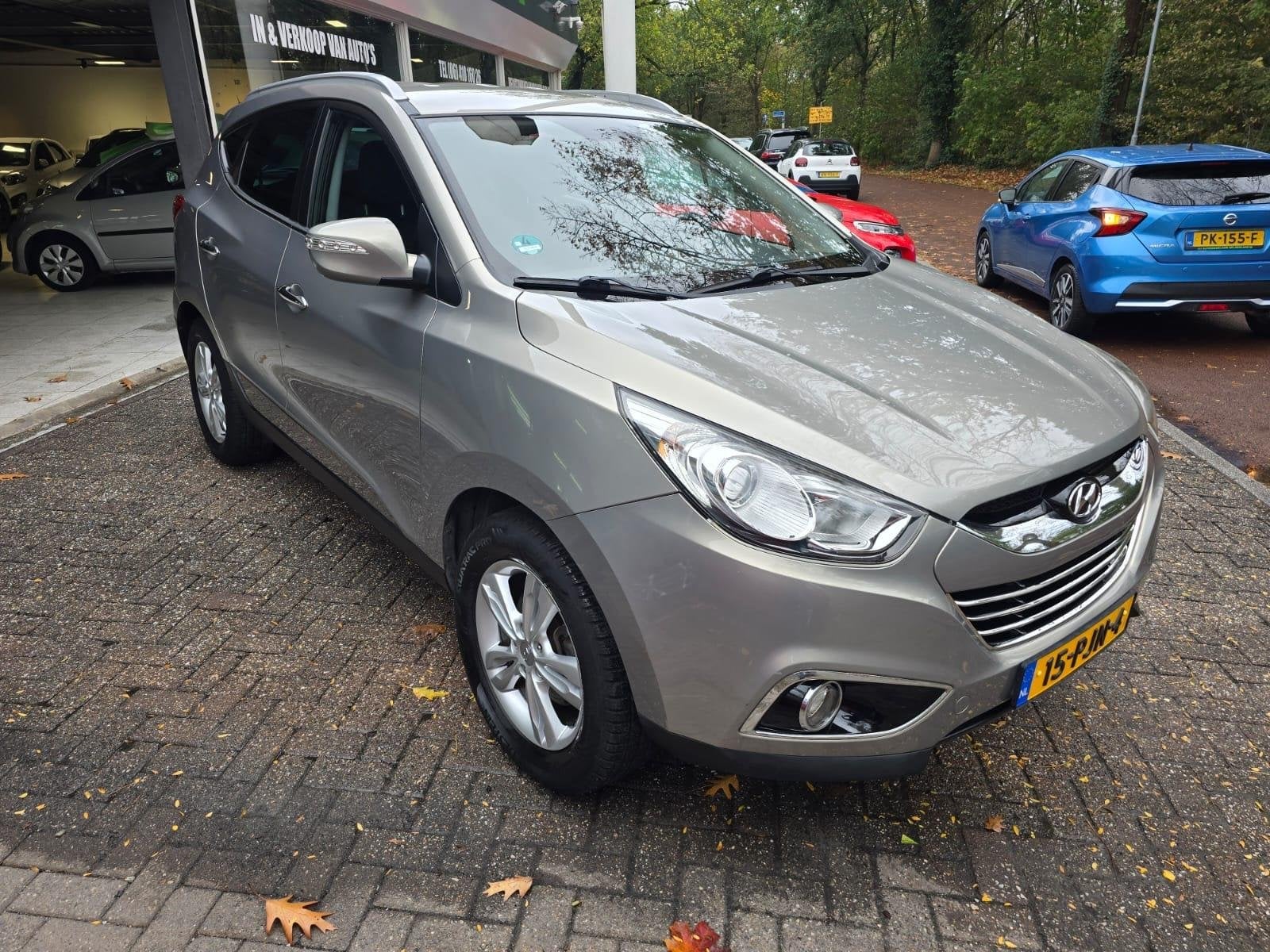 Hyundai ix35 2.0i 4WD Style | 1E EIGENAAR | NAVI | TREKHAAK, 13 km/l, Gebruikt, 4 cilinders, Leder en Stof