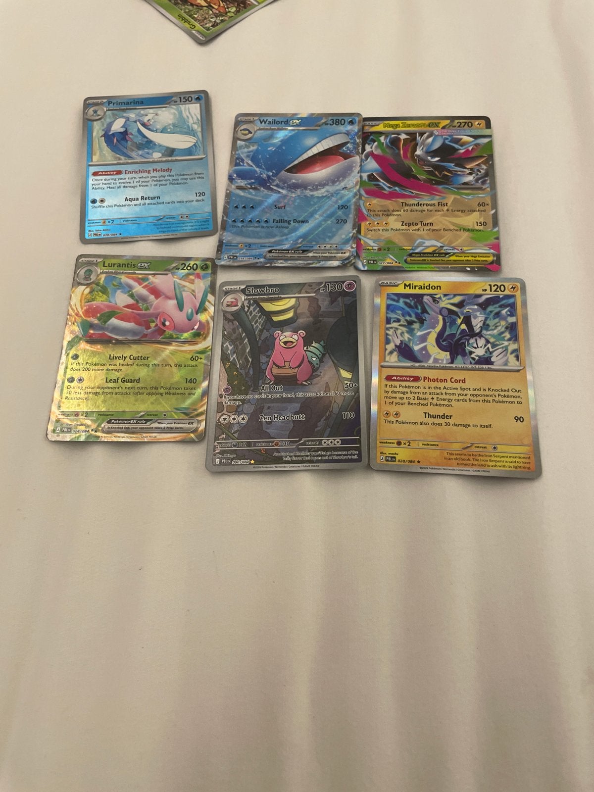 Pokémon Kaarten Collectie: Primarina, Wailord, Slowbro, Mira, Hobby en Vrije tijd, Verzamelkaartspellen | Pokémon, Ophalen of Verzenden