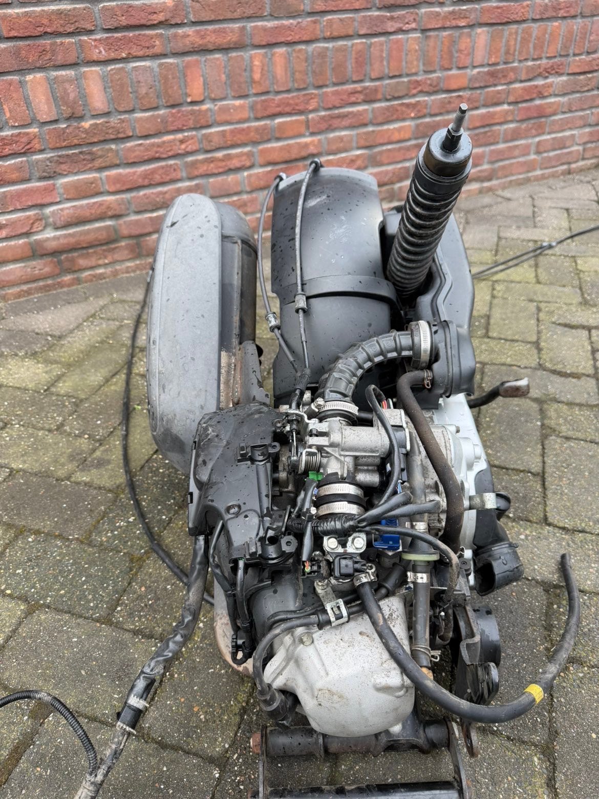 Motorblok piaggio zip e5, Ophalen