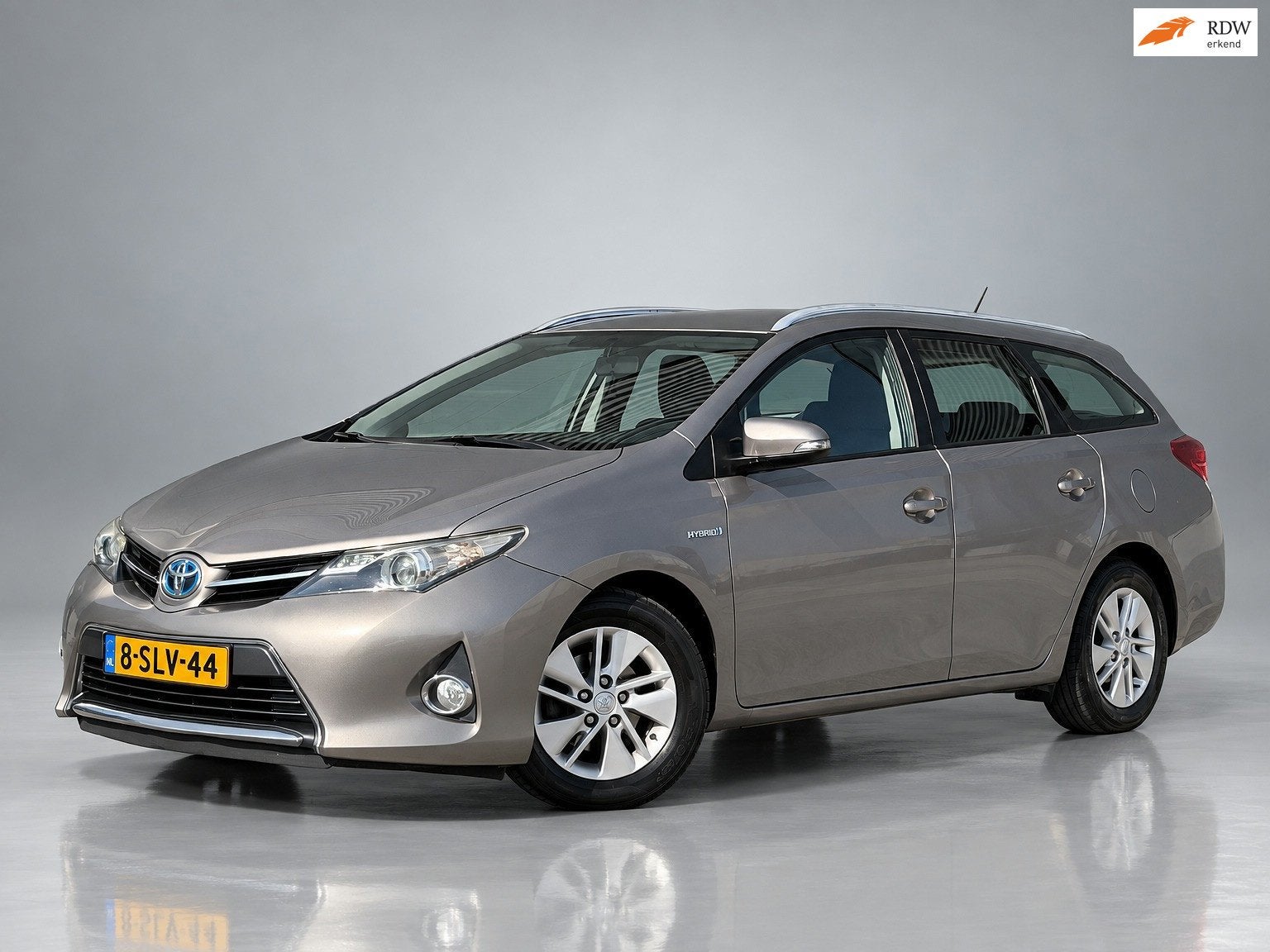 Toyota Auris Touring Sports 1.8 Hybrid Aspiration|Navigatie|, Auto's, Stof, Gebruikt, Zwart, Bruin