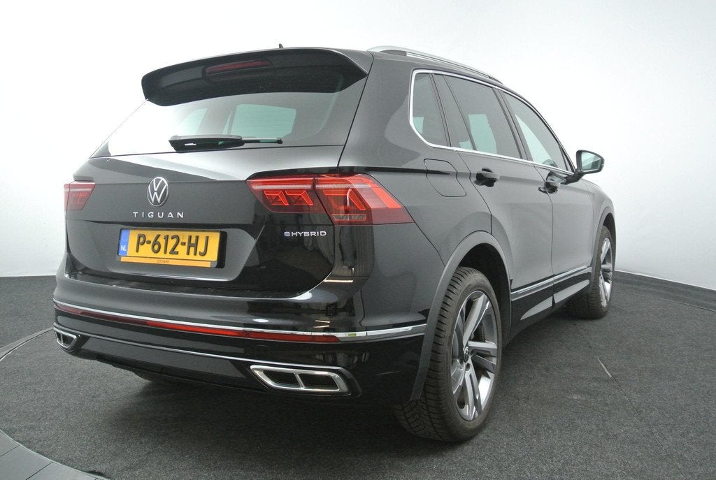 Volkswagen Tiguan 1.4 TSI 245pk DSG eHybrid R-Line Business+, Auto's, Stof, Met garantie (alle), Zwart, Grijs