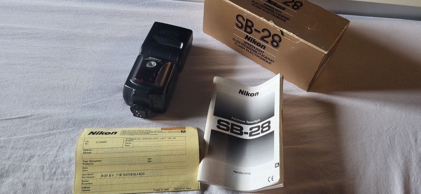 Nikon Speedlight SB-28 flitser met doos en handleiding, Ophalen of Verzenden, Zo goed als nieuw, Nikon, Kantelbaar