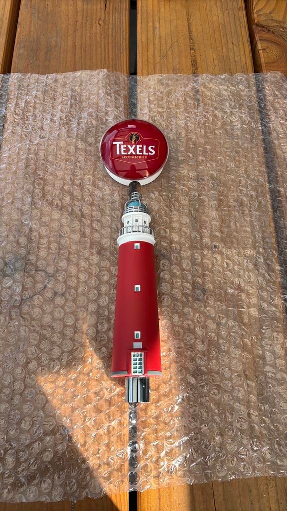 Texels taphendel vuurtoren en taplens, Verzamelen, Biermerken, Ophalen of Verzenden, Gebruikt, Flesje(s), Overige merken