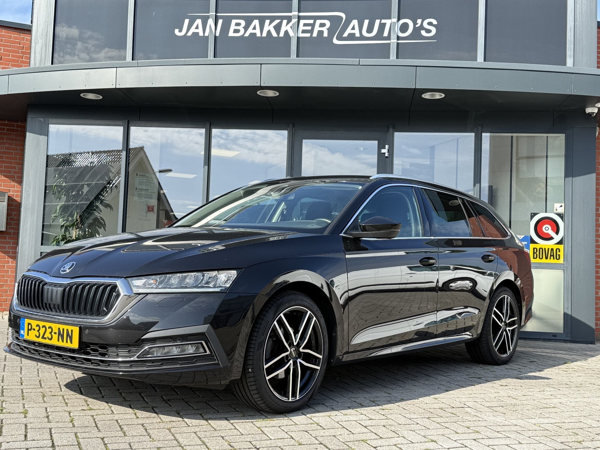 Skoda Octavia Combi 1.0 e-TSI Business Edition Plus  Auto, Auto's, Stof, Gebruikt, Zwart, 1253 kg
