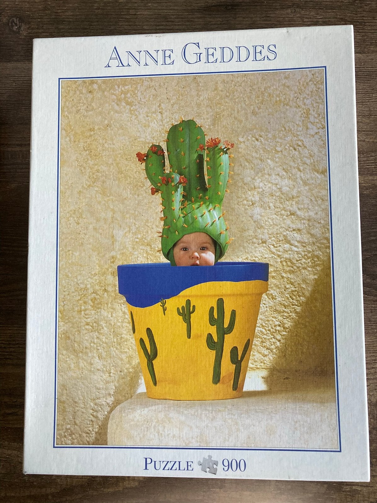 076 Anne Geddes puzzel cactus 900 stuks, Ophalen of Verzenden, 500 t/m 1500 stukjes, Zo goed als nieuw, Legpuzzel