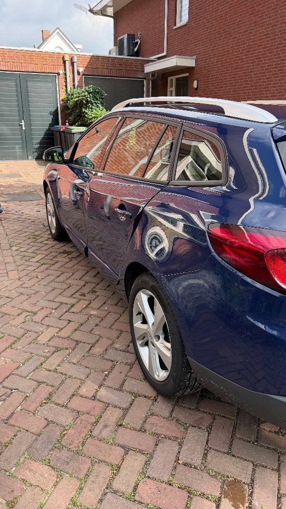 Foto 9 van Renault Mégane 1.5 DCI 81KW Estate 2012 met winterbanden