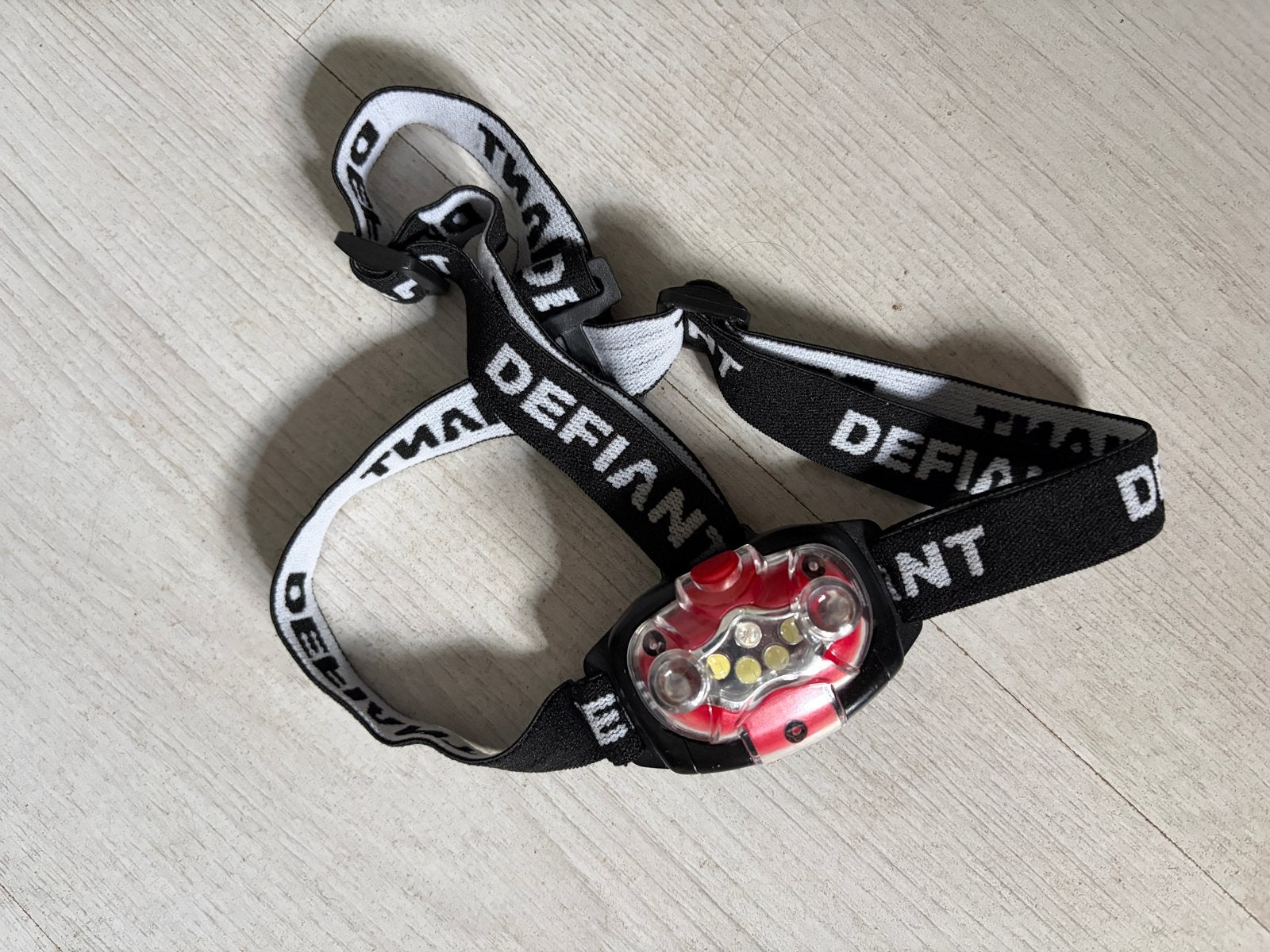 Defiant hoofdlamp met verstelbare band, Ophalen of Verzenden, Zo goed als nieuw, Batterij
