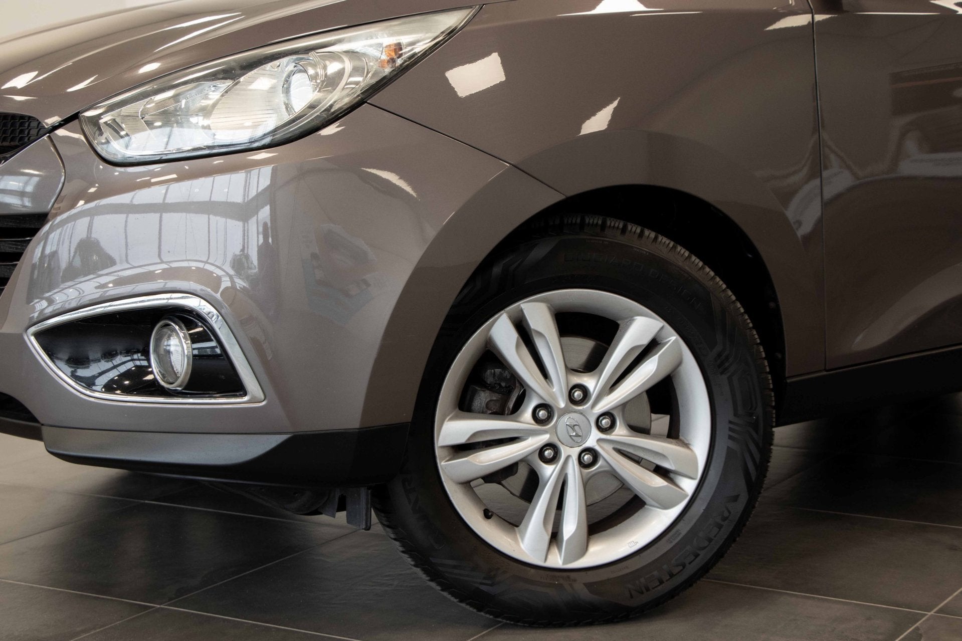 Hyundai Ix35 2.0i Business Edition | Automaat | Navigatie |, Auto's, Gebruikt, Zwart, 4 cilinders, Bruin