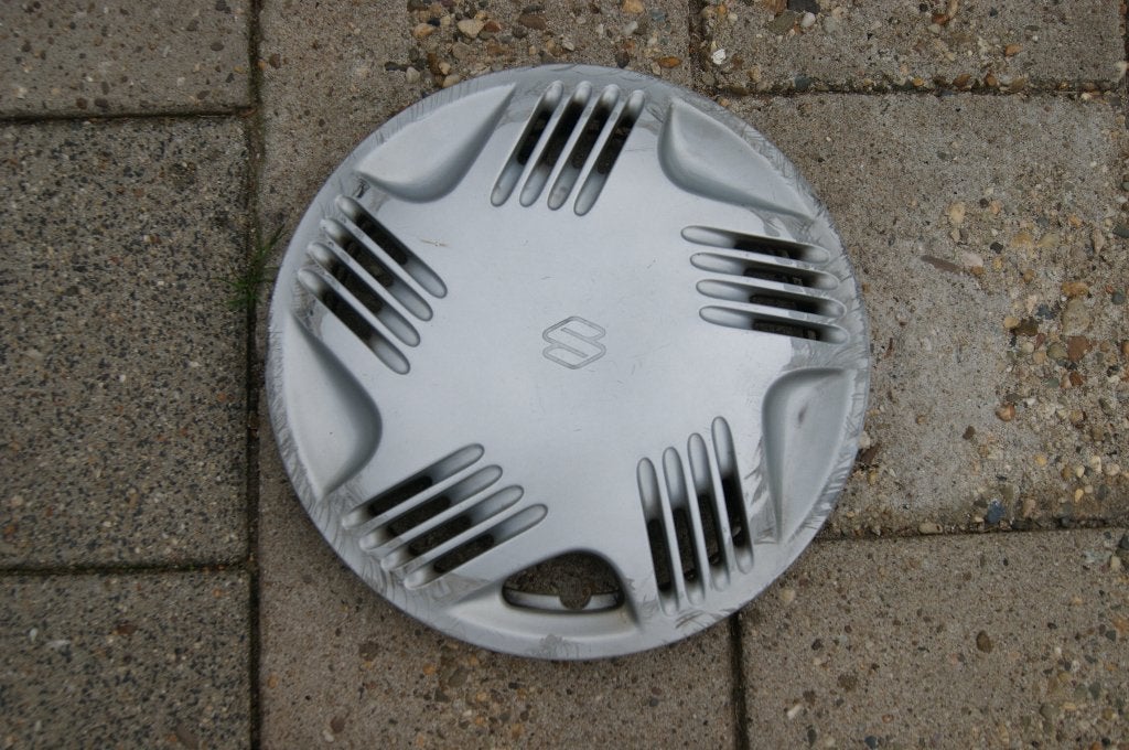 1 losse originele wieldop Suzuki Swift 13 inch, Ophalen of Verzenden, Gebruikt