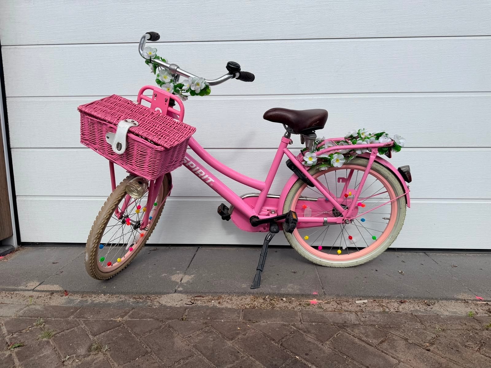 Roze kinderfiets Spirit met bloemenslinger, Ophalen, Gebruikt, Terugtraprem, 20 inch of meer