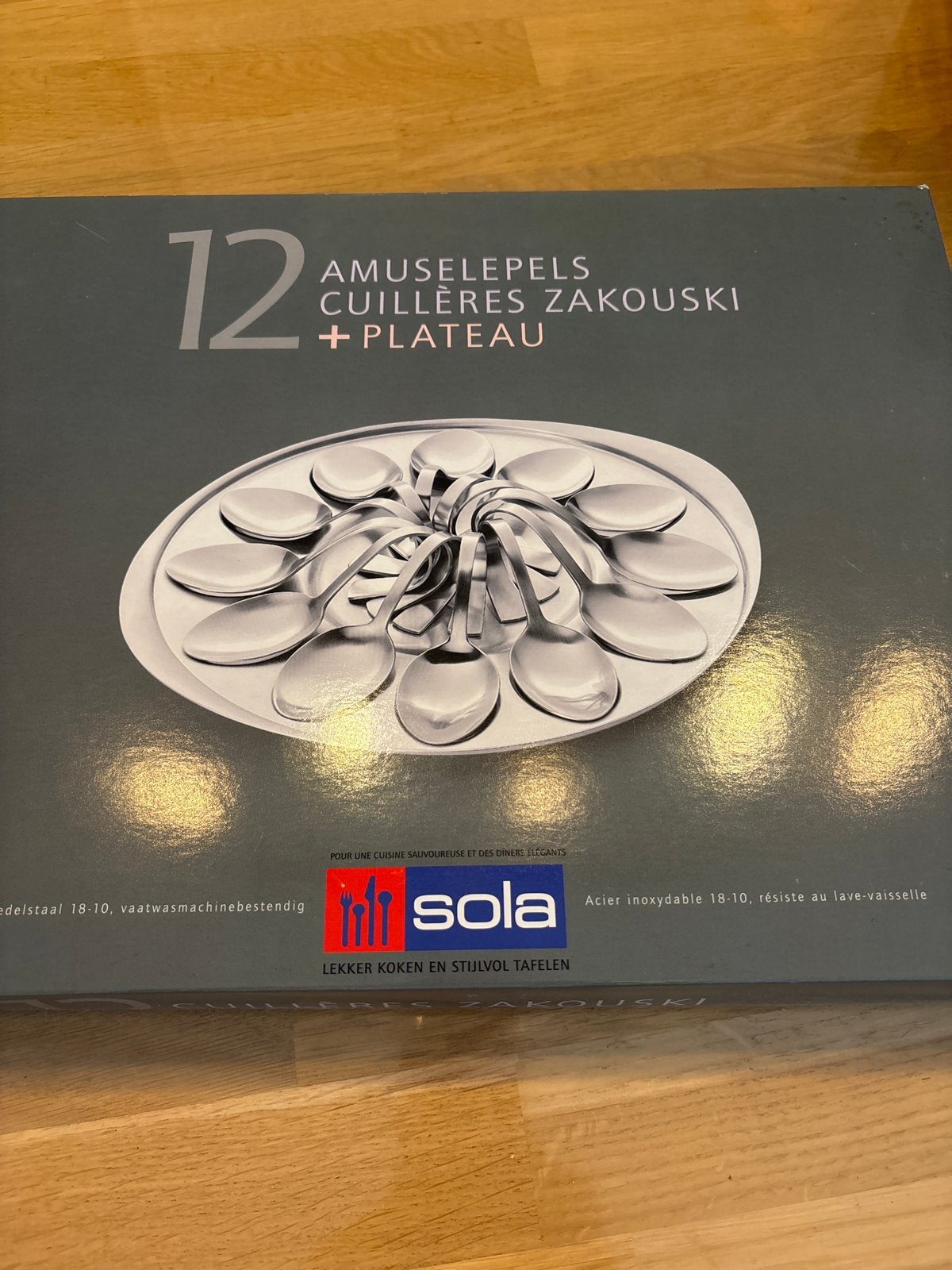 Sola Amuselepelset met Plateau - 12 lepels, Sola, Nieuw, Ophalen of Verzenden, Rvs of Chroom