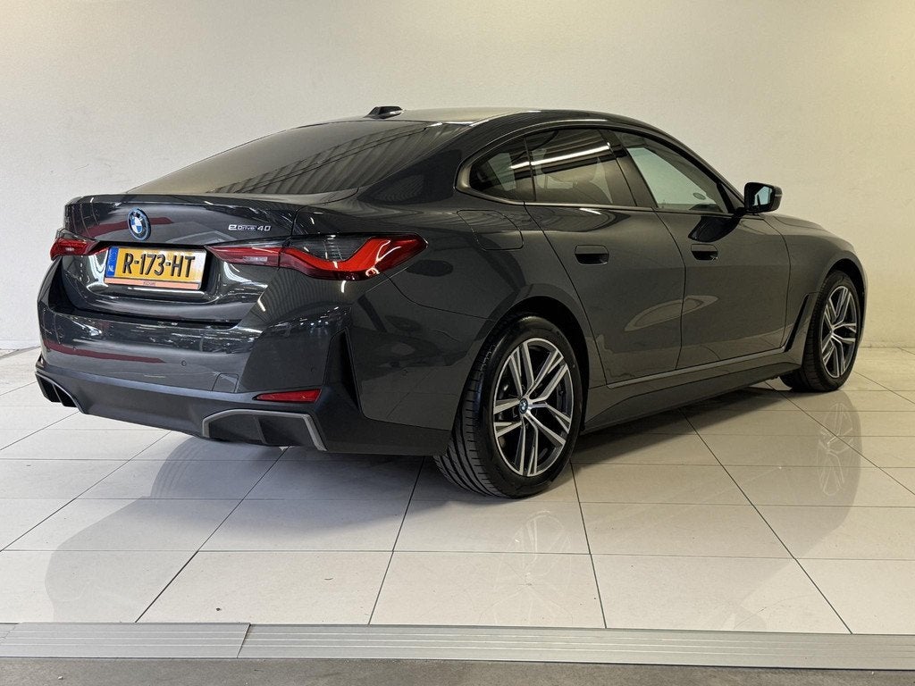 BMW i4 eDrive40 84 kWh | Navi | Camera | Carplay | soH 94%, Auto's, BMW, Achterwielaandrijving, Met garantie (alle), Leder en Stof