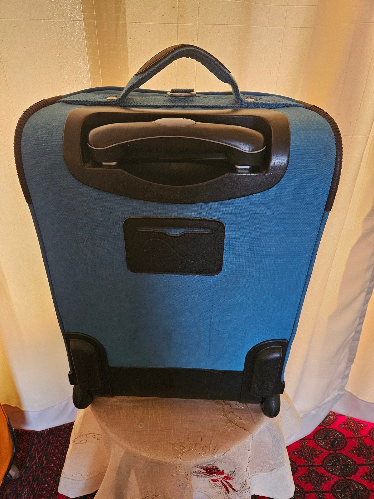 Kipling reiskoffer met wieltjes en uitschuifbare handgreep, Ophalen