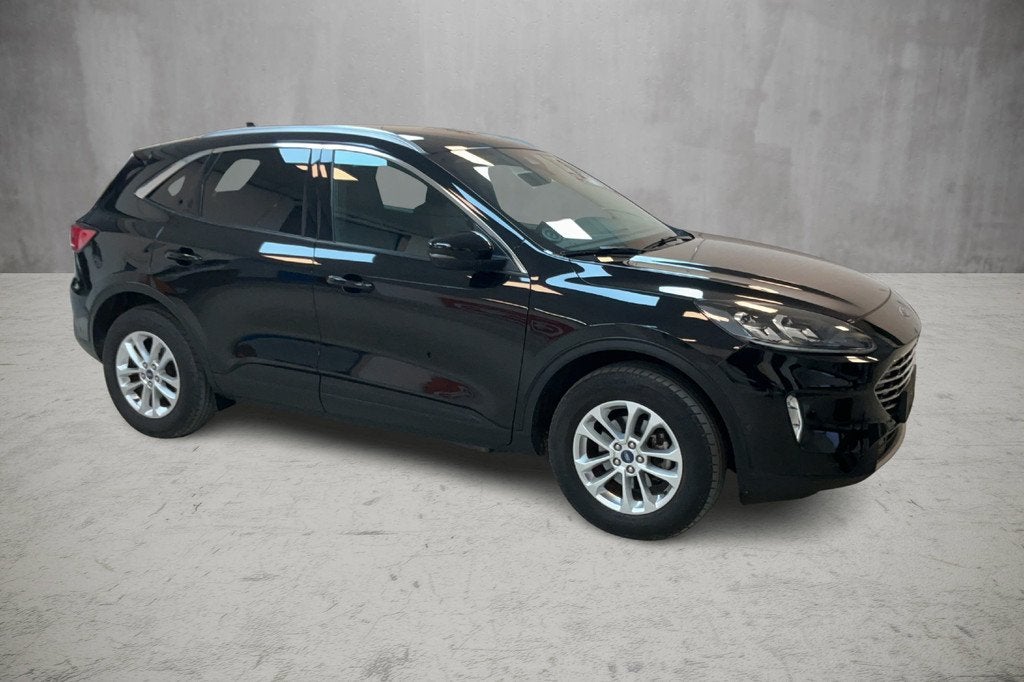 Ford Kuga 2.5 225 pk Titanium X PHEV Plug-in Hybrid Trekhaak, Auto's, Ford, Gebruikt, Zwart, 4 cilinders, Leder en Stof
