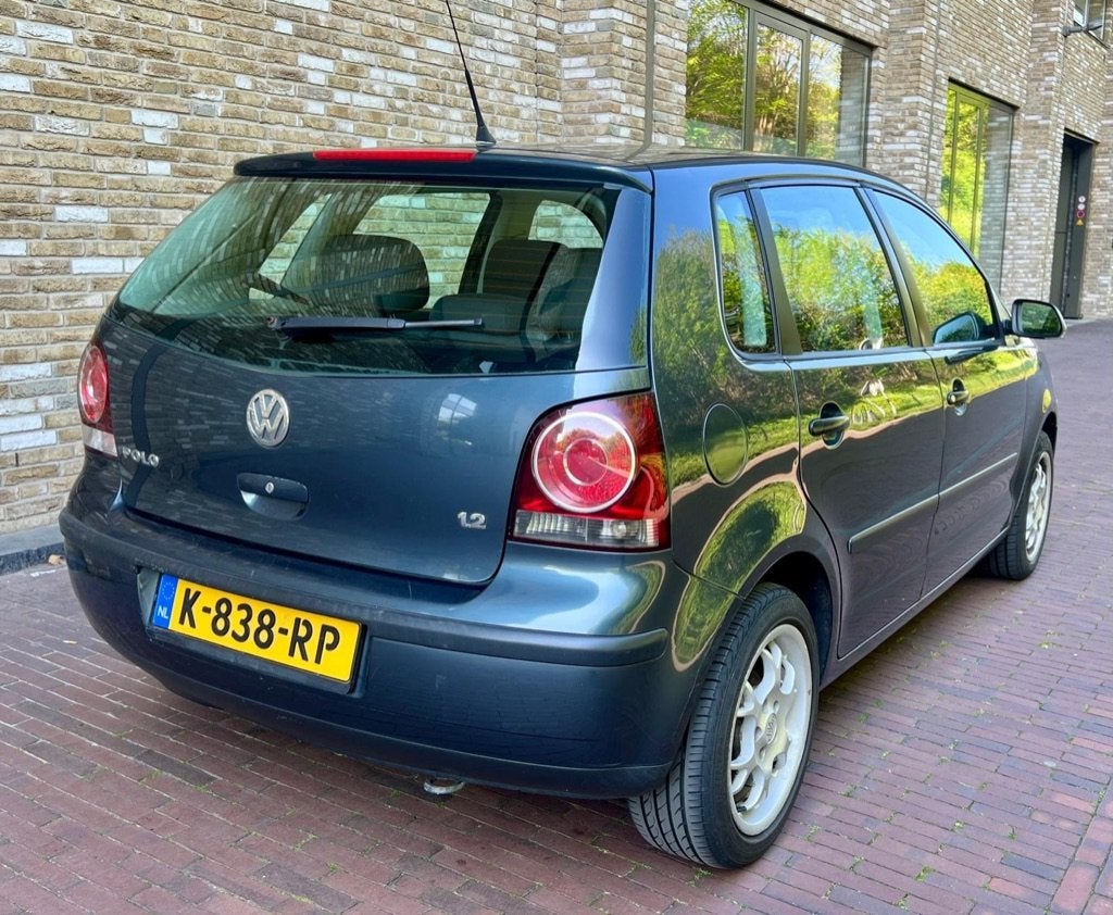Volkswagen Polo 1.2 Highline, BJ 2006 Scherm Netjes, Auto's, Volkswagen, Voorwielaandrijving, Euro 5, Stof, Zwart