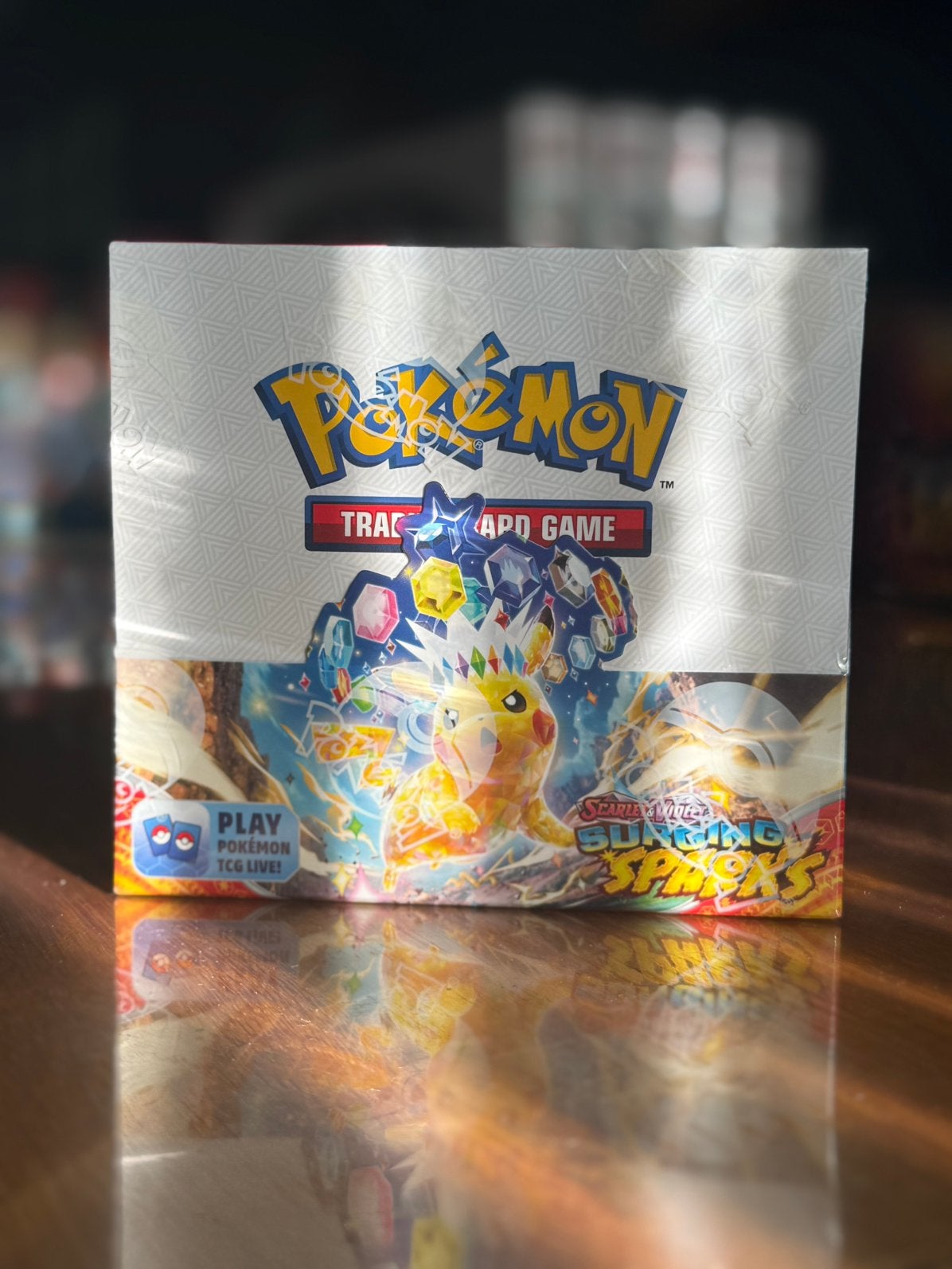 Surging Spark Booster Box, Ophalen of Verzenden, Zo goed als nieuw