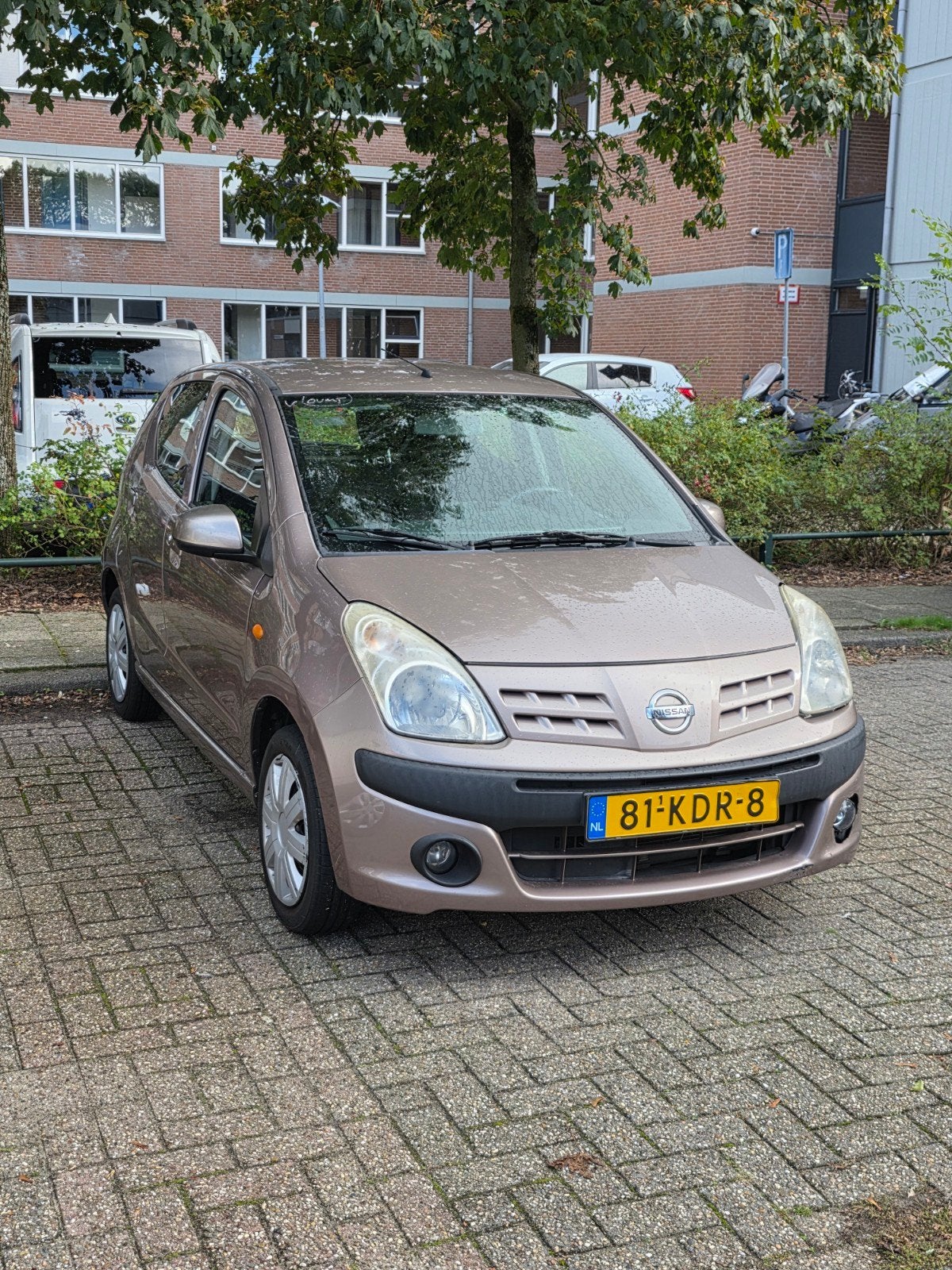Nissan Pixo 1.0 50KW 5D 2009 Beige, Auto's, Voorwielaandrijving, 4 stoelen, Origineel Nederlands, Handgeschakeld