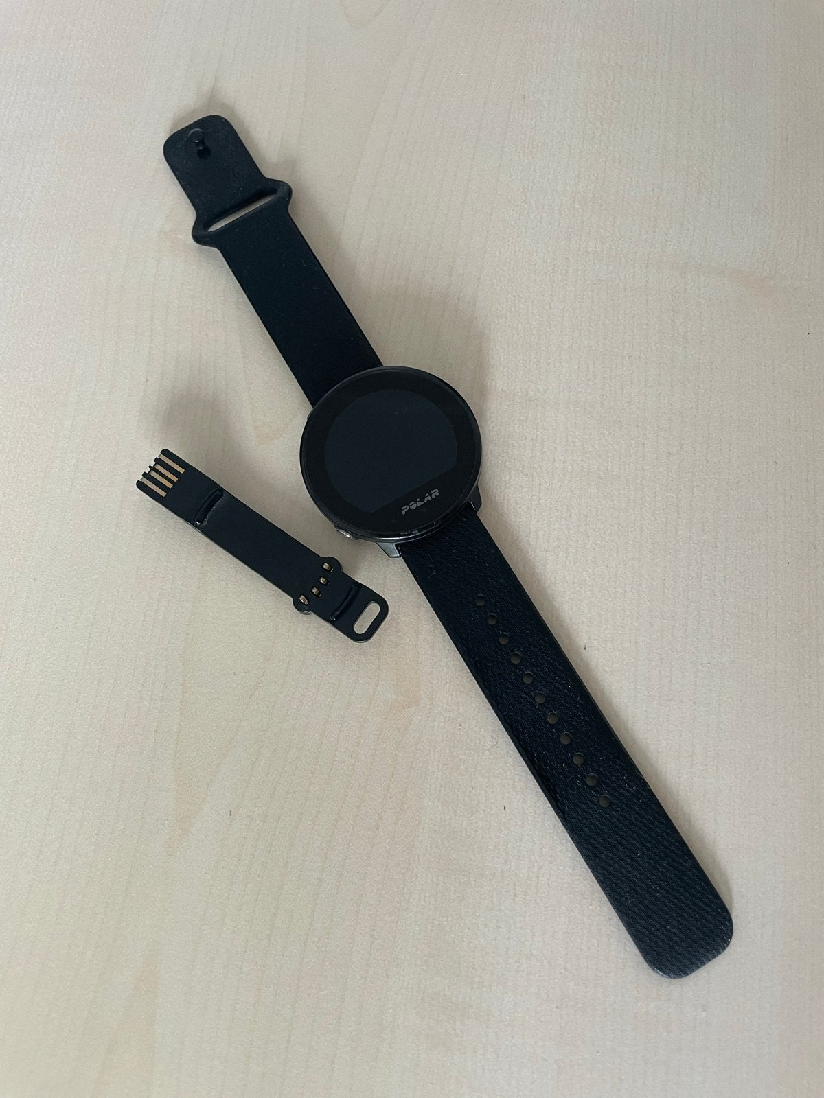 Polar Unite Fitness Horloge Zwart met Oplader, Gebruikt, Zwart, Ophalen of Verzenden, Waterdicht