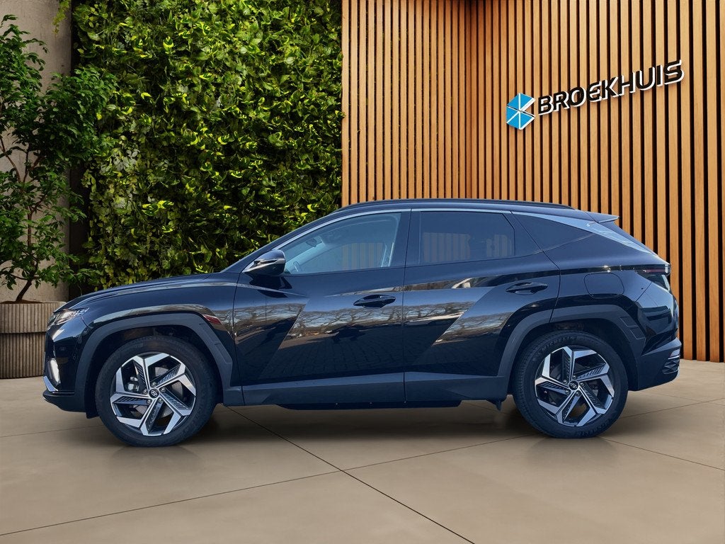Hyundai Tucson 1.6 T-GDI 265pk PHEV Premium 4WD, Gebruikt, Euro 6, 4 cilinders, Zwart