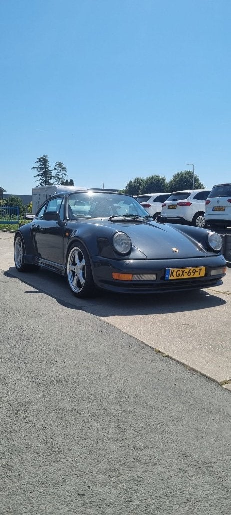 Porsche 911 Carrera uit 1985 - Grijs metallic, Auto's, Achterwielaandrijving, 4 stoelen, Leder en Stof, 231 pk