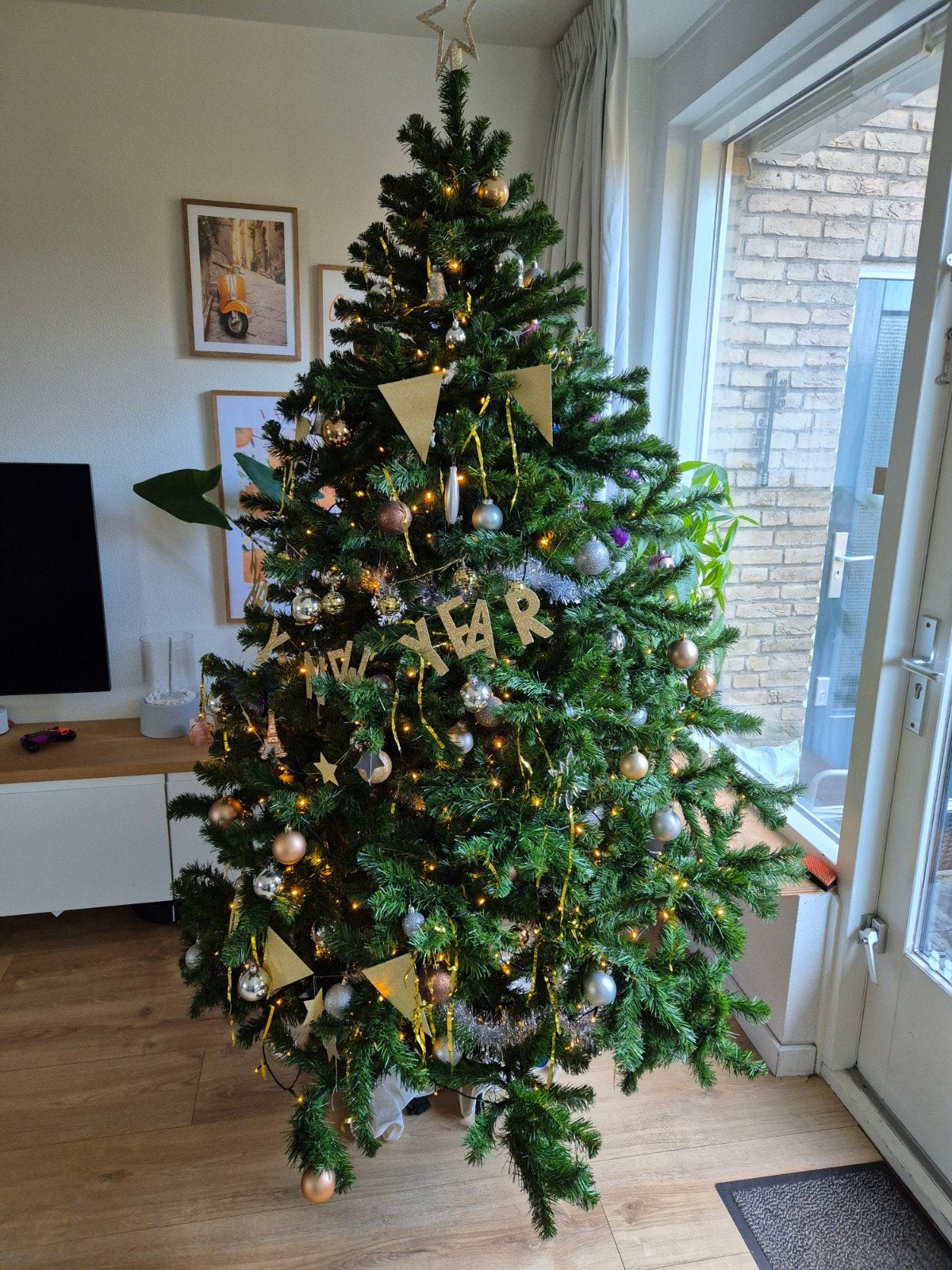 Kunst kerstboom, Ophalen