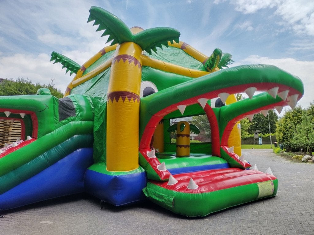 Springkussen huren krokodil multifun met glijbaan, Ophalen of Verzenden, Gebruikt, Overige